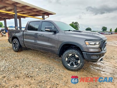 Czwarte zdjęcie samochodu z boku: 2020 RAM 1500 REBEL VIN:1C6SRFLT6LN221172 - miniatura