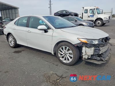 Czwarte zdjęcie samochodu z boku: 2022 TOYOTA CAMRY LE VIN:4T1C11AK9NU019965 - miniatura