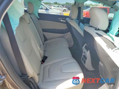 Zdjęcie 10 z 12 samochodu: 2019 FORD EDGE TITANIUM VIN:2FMPK3K96KBB49063 - miniatura