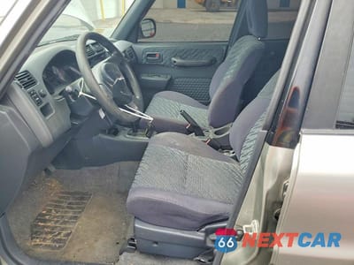 Zdjęcie 7 z 13 samochodu: 1999 TOYOTA RAV4 BASE VIN:JT3HP10V2X7141013 - miniatura