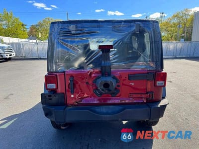Zdjęcie 6 z 11 samochodu: 2012 JEEP WRANGLER UNLIMITED SPORT VIN:1C4BJWDG0CL121971 - miniatura