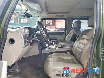 Zdjęcie 7 z 13 samochodu: 2003 HUMMER H2 VIN:5GRGN23U33H101063 - miniatura