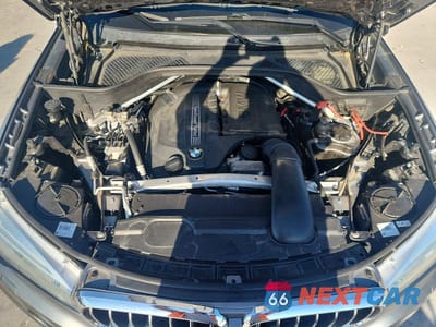 Zdjęcie 12 z 13 samochodu: 2014 BMW X5 SDRIVE35I VIN:5UXKR2C58E0C00280 - miniatura
