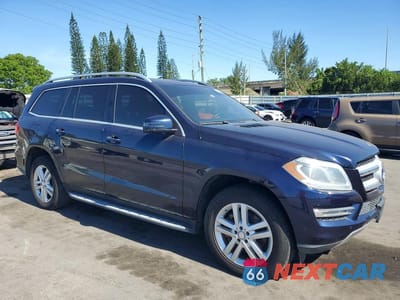 Czwarte zdjęcie samochodu z boku: 2014 MERCEDES-BENZ GL 450 4MATIC VIN:4JGDF7CE9EA333620 - miniatura