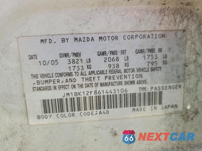 Zdjęcie 13 z 13 samochodu: 2006 MAZDA 3 I VIN:JM1BK12F861443106 - miniatura