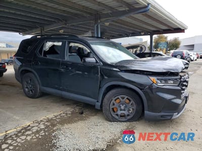 Czwarte zdjęcie samochodu z boku: 2025 HONDA PILOT TRAILSPORT VIN:5FNYG1H60SB043707 - miniatura
