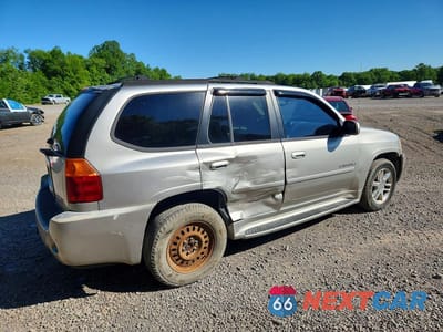 Trzecie zdjęcie samochodu z tyłu: 2006 GMC ENVOY DENALI VIN:1GKES63M562238722 - miniatura
