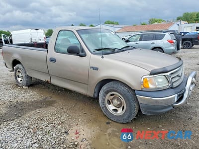 Czwarte zdjęcie samochodu z boku: 2002 FORD F150 VIN:1FTRF17282NB74407 - miniatura
