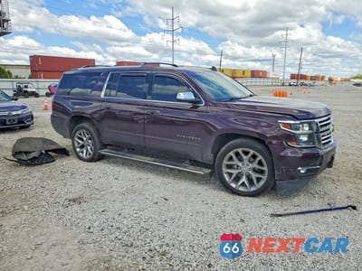 Czwarte zdjęcie samochodu z boku: 2017 CHEVROLET SUBURBAN K1500 PREMIER VIN:1GNSKJKC1HR283216 - miniatura