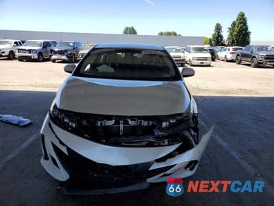 Piąte zdjęcie samochodu w środku: 2017 TOYOTA PRIUS PRIME PREMIUM VIN:JTDKARFP4H3042924 - miniatura