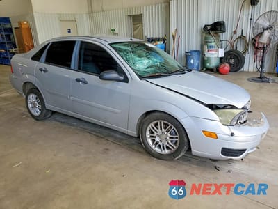 Czwarte zdjęcie samochodu z boku: 2007 FORD FOCUS ZX4 VIN:1FAFP34N97W206900 - miniatura