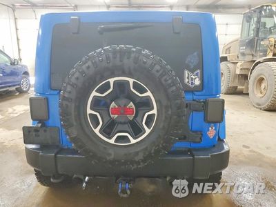 Zdjęcie 6 z 13 samochodu: 2011 JEEP WRANGLER UNLIMITED SAHARA VIN:1J4BA5H16BL600159 - miniatura