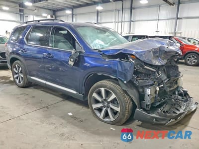 Czwarte zdjęcie samochodu z boku: 2023 HONDA PILOT TOURING VIN:5FNYG1H7XPB056447 - miniatura