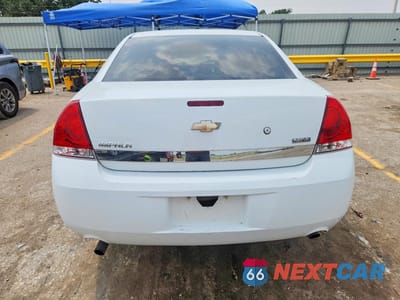 Zdjęcie 6 z 12 samochodu: 2010 CHEVROLET IMPALA POLICE VIN:2G1WD5EM8A1172931 - miniatura