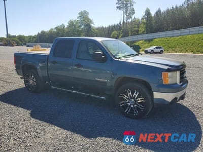 Czwarte zdjęcie samochodu z boku: 2007 GMC NEW SIERRA C1500 VIN:2GTEC13JX71589788 - miniatura