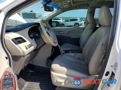Zdjęcie 7 z 14 samochodu: 2014 TOYOTA SIENNA XLE 8-PASSENGER VIN:5TDYK3DC6ES437458 - miniatura