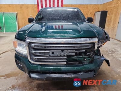 Piąte zdjęcie samochodu w środku: 2015 GMC CANYON VIN:1GTH6AEA3F1215075 - miniatura