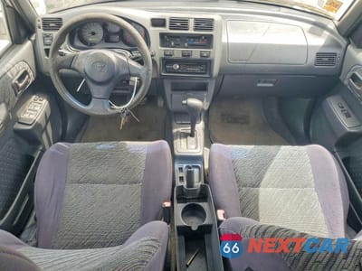 Zdjęcie 8 z 13 samochodu: 2000 TOYOTA RAV4 BASE VIN:JT3GP10V7Y7067004 - miniatura