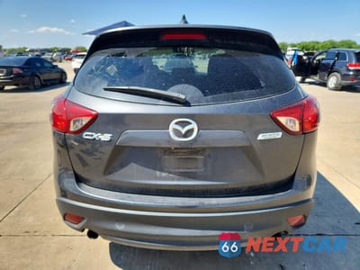 Zdjęcie 6 z 12 samochodu: 2014 MAZDA CX-5 TOURING VIN:JM3KE2CYXE0319766 - miniatura