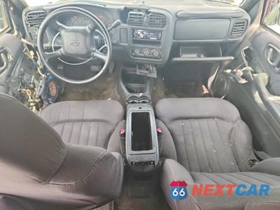 Zdjęcie 8 z 13 samochodu: 2003 CHEVROLET BLAZER VIN:1GNCS13X43K172621 - miniatura