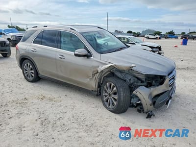 Czwarte zdjęcie samochodu z boku: 2021 MERCEDES-BENZ GLE 350 VIN:4JGFB4JB2MA427123 - miniatura