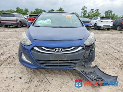 Piąte zdjęcie samochodu w środku: 2013 HYUNDAI ELANTRA VIN:KMHD35LE0DU037640 - miniatura