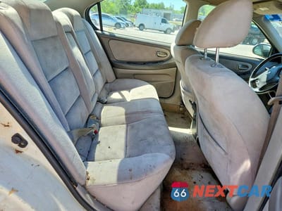 Zdjęcie 10 z 12 samochodu: 2002 NISSAN MAXIMA GXE VIN:JN1DA31D82T420756 - miniatura