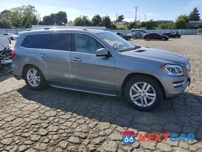 Czwarte zdjęcie samochodu z boku: 2015 MERCEDES-BENZ GL 450 4MATIC VIN:4JGDF6EE2FA517662 - miniatura