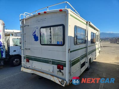 Czwarte zdjęcie samochodu z boku: 1990 FORD ECONOLINE E350 MOTOR HOME CHASSIS VIN:1FCKE33G8LHA49411 - miniatura