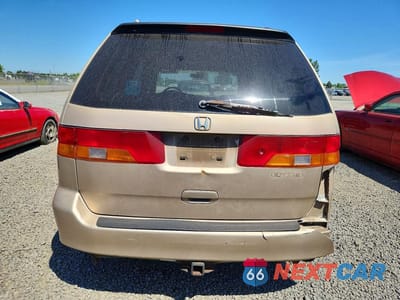 Zdjęcie 6 z 13 samochodu: 2002 HONDA ODYSSEY LX VIN:2HKRL18502H508110 - miniatura
