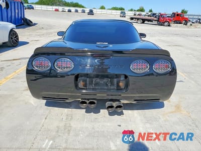 Zdjęcie 6 z 12 samochodu: 1999 CHEVROLET CORVETTE VIN:1G1YY22G2X5122625 - miniatura