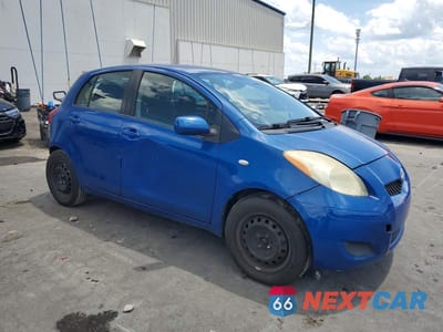 Czwarte zdjęcie samochodu z boku: 2009 TOYOTA YARIS BASE VIN:JTDKT903895260581 - miniatura