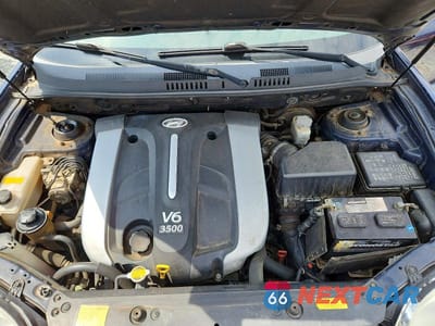Zdjęcie 12 z 14 samochodu: 2005 HYUNDAI SANTA FE GLS VIN:KM8SC13E65U877827 - miniatura