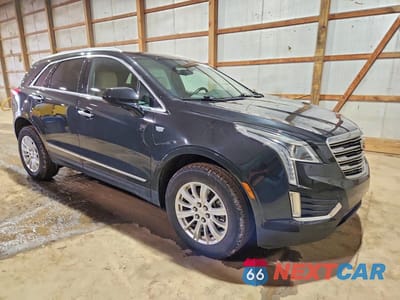 Czwarte zdjęcie samochodu z boku: 2017 CADILLAC XT5 VIN:1GYKNARS0HZ115025 - miniatura