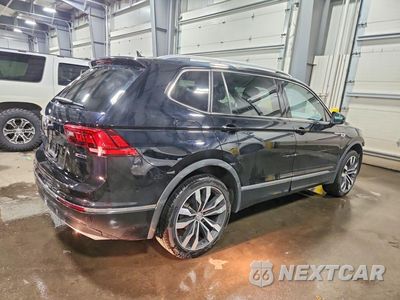 Trzecie zdjęcie samochodu z tyłu: 2021 VOLKSWAGEN TIGUAN SEL PREMIUM R-LINE VIN:3VV4B7AX8MM048012 - miniatura