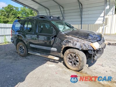 Czwarte zdjęcie samochodu z boku: 2015 NISSAN XTERRA PRO-4X VIN:5N1AN0NW9FN653825 - miniatura