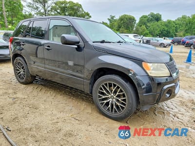 Czwarte zdjęcie samochodu z boku: 2010 SUZUKI GRAND VITARA PREMIUM VIN:JS3TE0D20A4100878 - miniatura