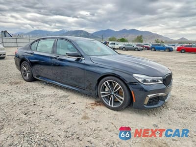 Czwarte zdjęcie samochodu z boku: 2016 BMW 750 XI VIN:WBA7F2C52GG417229 - miniatura