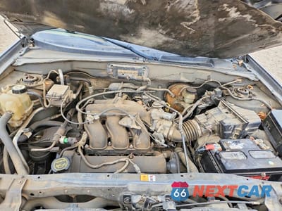 Zdjęcie 12 z 13 samochodu: 2003 FORD ESCAPE VIN:1FMYU92183KA01595 - miniatura