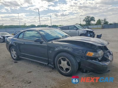Czwarte zdjęcie samochodu z boku: 2004 FORD MUSTANG VIN:1FAFP40614F233654 - miniatura