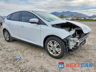 Czwarte zdjęcie samochodu z boku: 2012 FORD FOCUS SEL VIN:1FAHP3M20CL393776 - miniatura