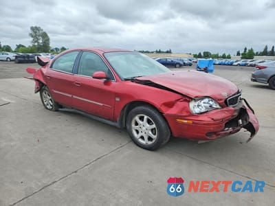 Czwarte zdjęcie samochodu z boku: 2000 MERCURY SABLE LS VIN:1MEFM53S4YG634373 - miniatura
