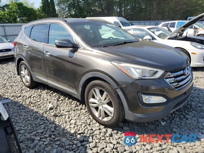 Czwarte zdjęcie samochodu z boku: 2013 HYUNDAI SANTA FE SPORT 2.0T VIN:5XYZUDLA3DG046686 - miniatura