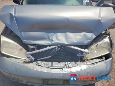 Zdjęcie 11 z 12 samochodu: 2005 FORD FOCUS ZX4 VIN:1FAFP34N35W232812 - miniatura