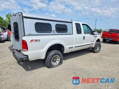 Trzecie zdjęcie samochodu z tyłu: 1999 FORD F250 SUPER DUTY VIN:1FTNX21F9XED23489 - miniatura