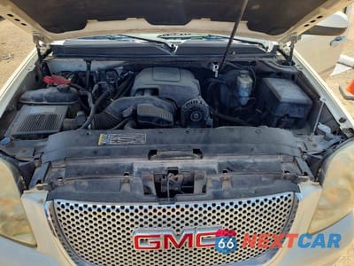 Zdjęcie 12 z 13 samochodu: 2010 GMC YUKON DENALI VIN:1GKUCEEF2AR230790 - miniatura
