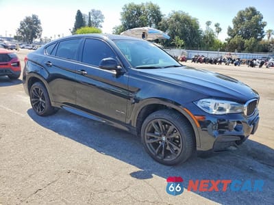 Czwarte zdjęcie samochodu z boku: 2019 BMW X6 XDRIVE35I VIN:5UXKU2C54K0Z64876 - miniatura