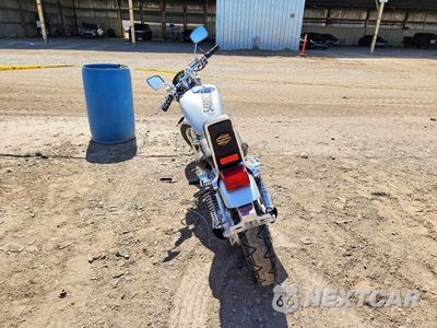 Czwarte zdjęcie samochodu z boku: 2004 SUZUKI VS800 GLP VIN:JS1VS52A742101382 - miniatura