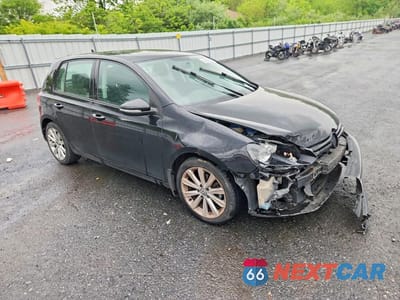 Czwarte zdjęcie samochodu z boku: 2014 VOLKSWAGEN GOLF VIN:WVWDM7AJ9EW000203 - miniatura