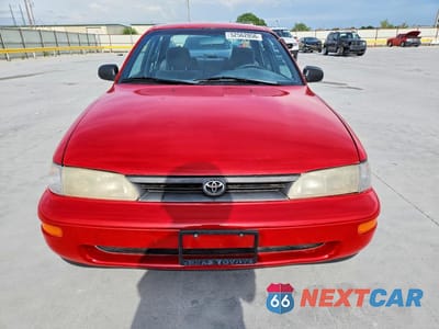 Piąte zdjęcie samochodu w środku: 1993 TOYOTA COROLLA DX VIN:1NXAE09E9PZ065030 - miniatura